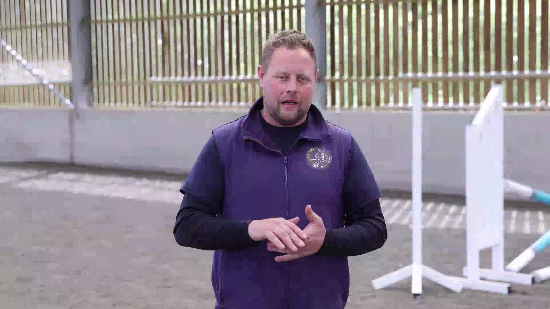 Dan Barnes coaching in the arena at HRB Equestrian